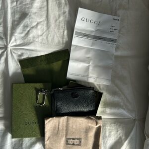 GG Marmont keychain card case.  It was purchased in March 2024.